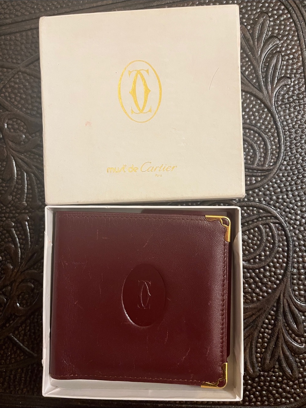 Cartier Men's Burgundy Leather Wallet with Gold Corner Accents
